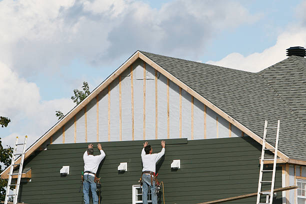 Professional Siding technician working in Lumberton, NC